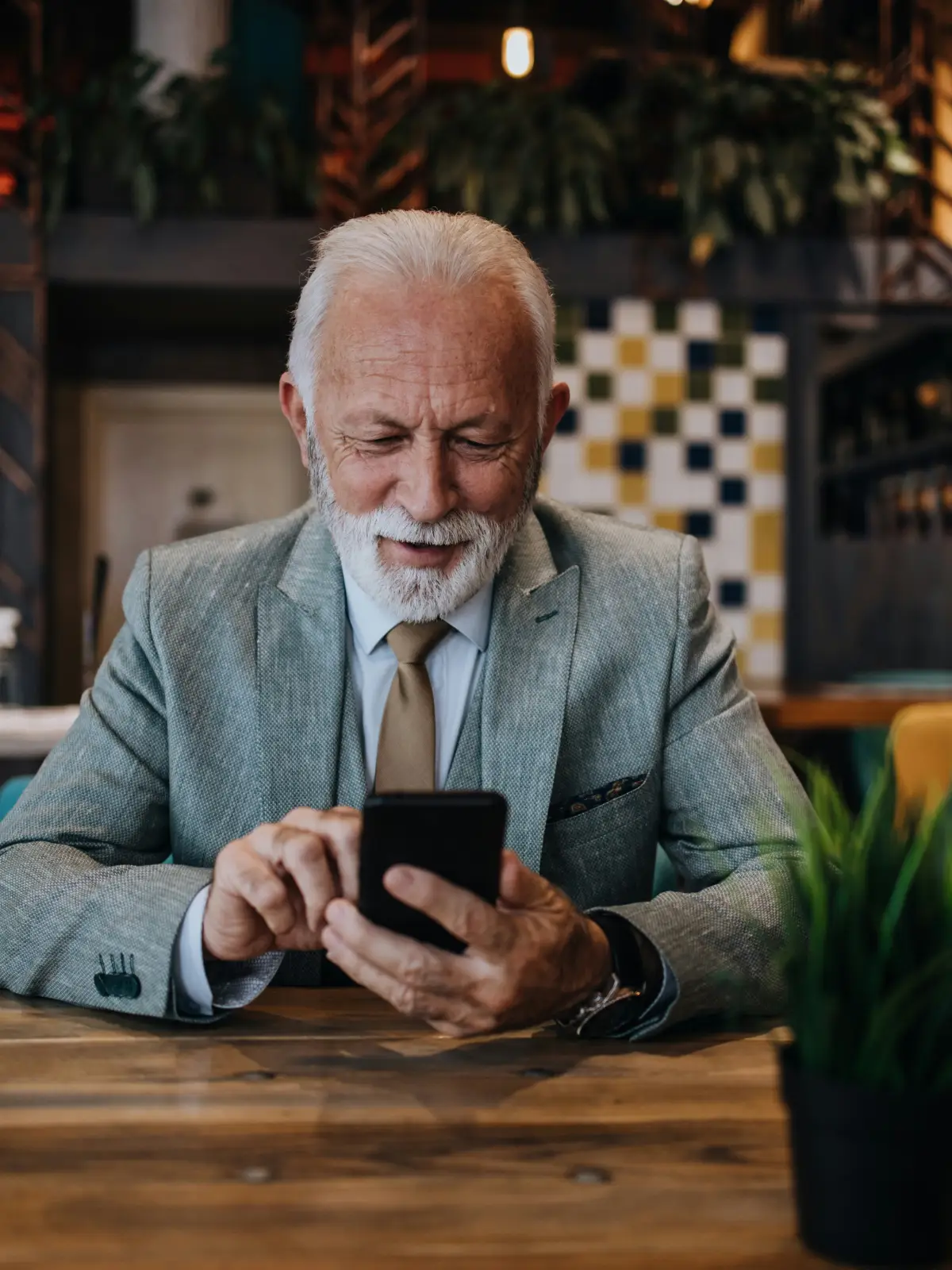 Grandfather smiling while recording a story